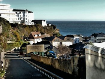 View of sea with buildings in background