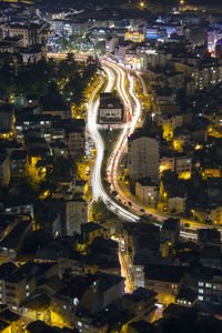 High angle view of illuminated cityscape at night