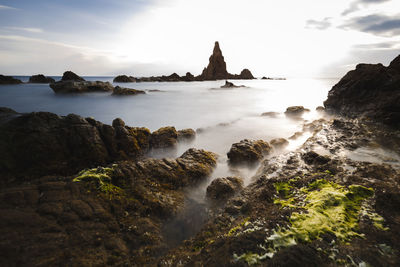 Scenic view of rocks against sky