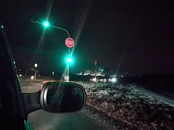 Car on road at night