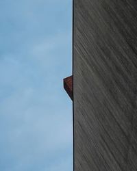 Low angle view of built structure against blue sky