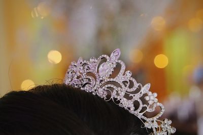 Close-up of woman wearing tiara on head