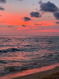 Scenic view of sea against romantic sky at sunset