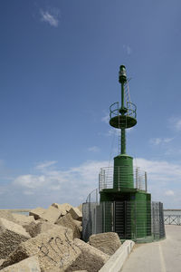 View of lighthouse against blue sky