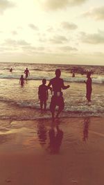 People enjoying at beach