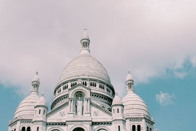 Low angle view of basilique du sacre coeur against sky