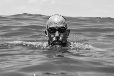 Man swimming in sea