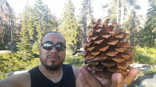 Portrait of man in forest