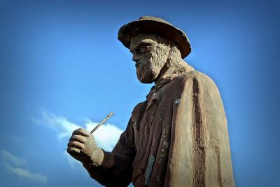 Low angle view of big ben against clear blue sky