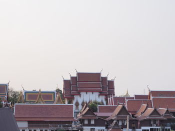 Low angle view of buildings against clear sky