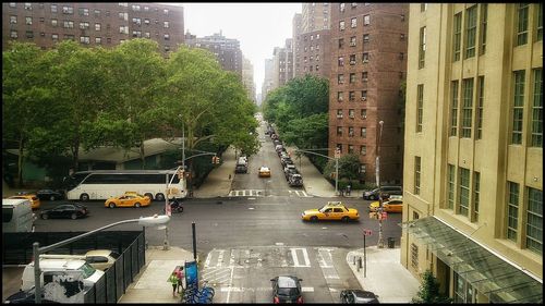 Cars on road in city