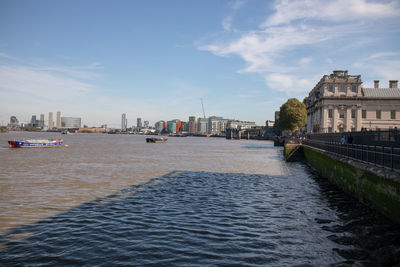 River passing through city buildings