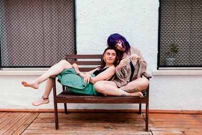 Two young women in the backyard in the summer having fun