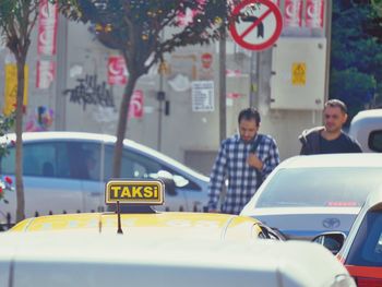 Taxi stuck in traffic on road