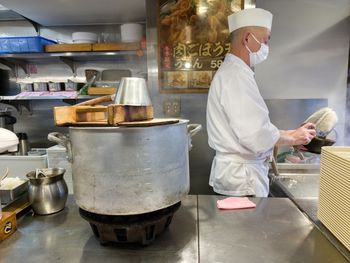 Man preparing food in restaurant