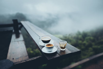 High angle view of coffee cups on table