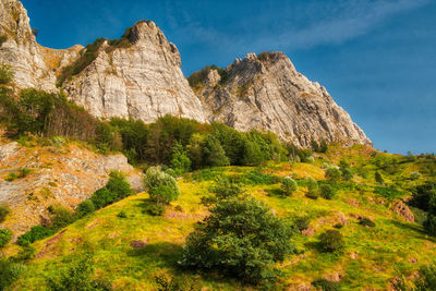 Scenic view of rocky mountains against sky