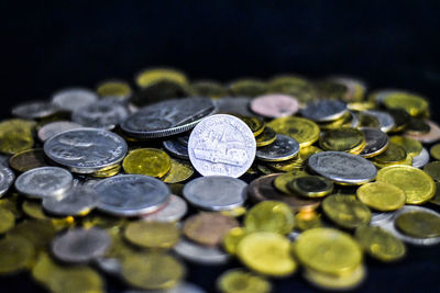 High angle view of coins on table