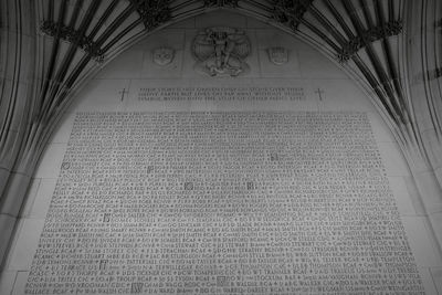 Low angle view of text on ceiling at home