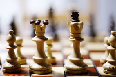 Close-up of chess pieces on board