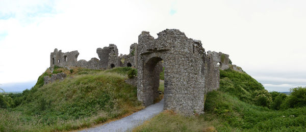 Low angle view of old building against sky