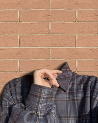 Low section of man on wall