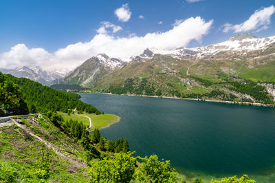 Upper engadine, lake sils, and the village of isola, photographed from above in summer.