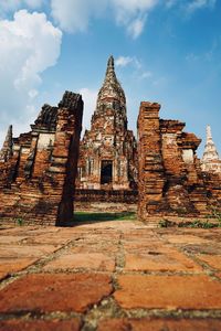 Old temple building against sky