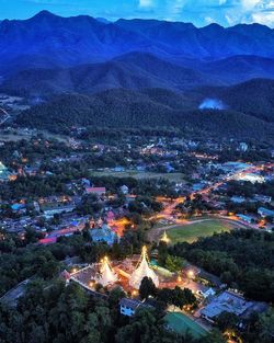 Aerial view of illuminated mountain range at night