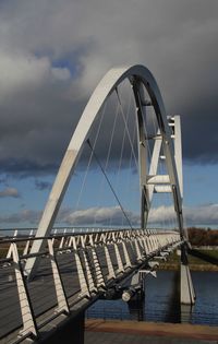 View of bridge over river against sky