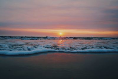 Scenic view of sea against sky during sunset