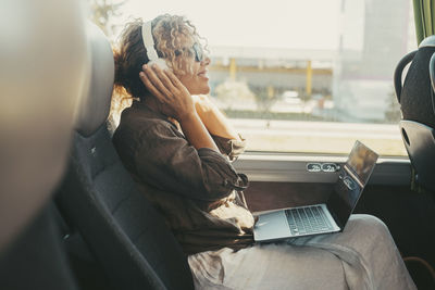 Young woman using mobile phone