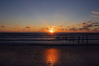 Scenic view of sea at sunset