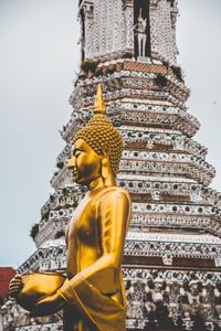 Low angle view of statue of temple