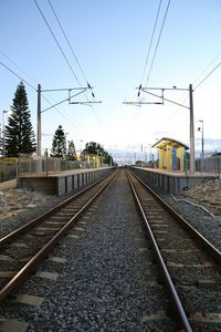 Railroad tracks against sky