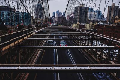 High angle view of bridge with city skyline in background