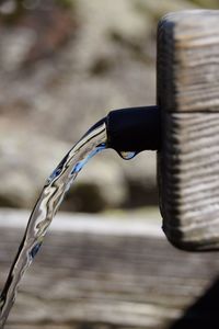 Close-up of water falling from faucet