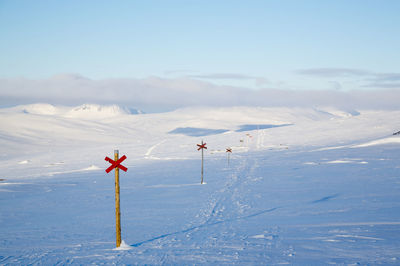 Winter landscape with trail markings