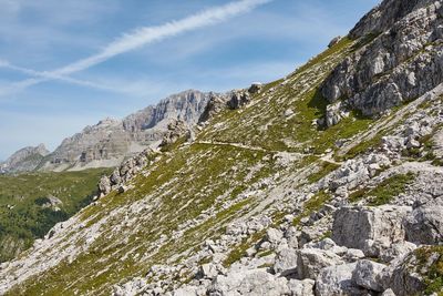 Low angle view of rocks against sky