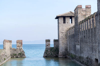 Fortified wall at lake garda against sky