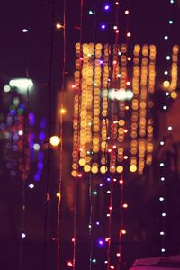 Close-up of illuminated lighting equipment