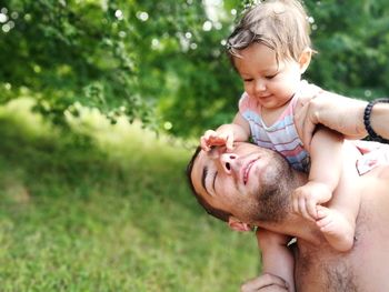 Close-up of mother holding baby girl