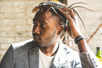 Portrait of young man looking away