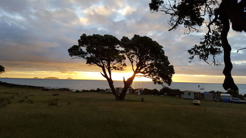 Scenic view of sea against sky at sunset