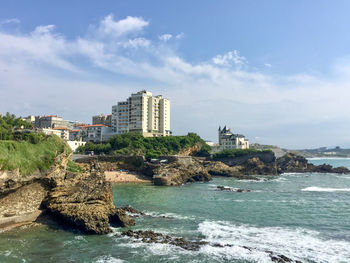Biarritz coastal line view from atlantic ocean. summer. basque country. france. rocky cliffs