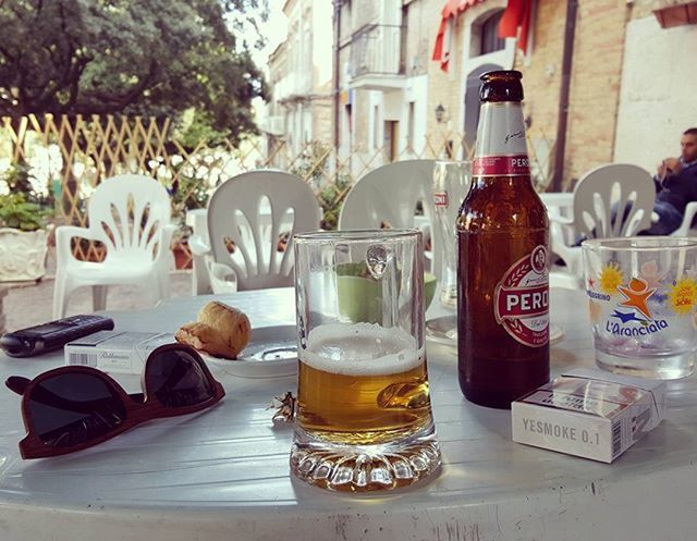 table, building exterior, architecture, built structure, food and drink, drink, incidental people, chair, refreshment, day, restaurant, city, sidewalk cafe, cafe, still life, variation, water, window, indoors, in a row