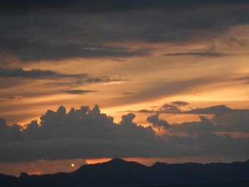 Scenic view of dramatic sky during sunset