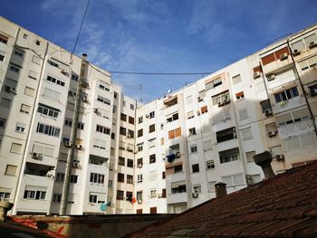 Low angle view of residential buildings against sky