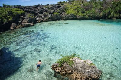 Swimming on lake waekuri, sumba island 