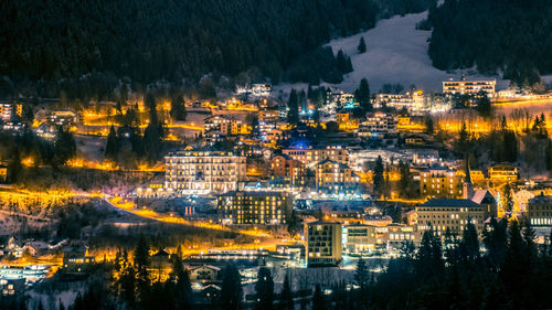 High angle view of illuminated cityscape at night